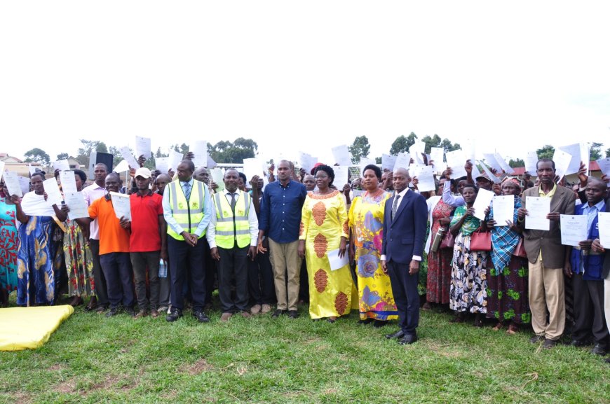 Joy In Kamwenge As Residents Receive Freehold Titles