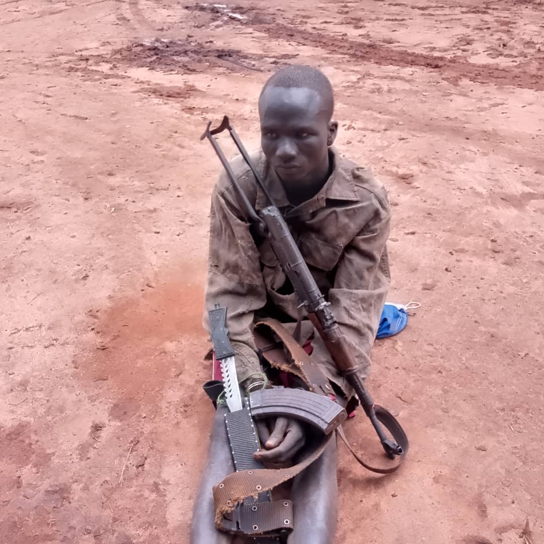 Peace Restored!! UPDF Arrests Gunman and Seizes Hidden Weapons in Lamwo