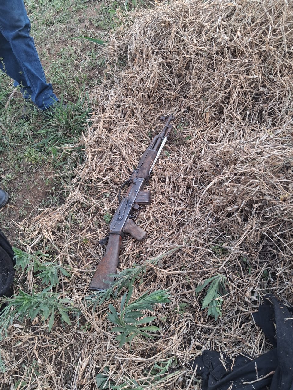 Missing Police Gun Found Hidden in Bean Husks in Kassanda After Weeks of Search