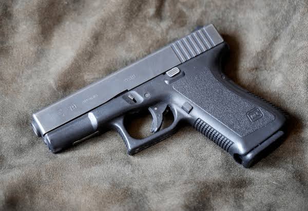 Police Recover Stolen Pistol As Two Suspects Arrested In Mukono Aggravated Theft Investigation